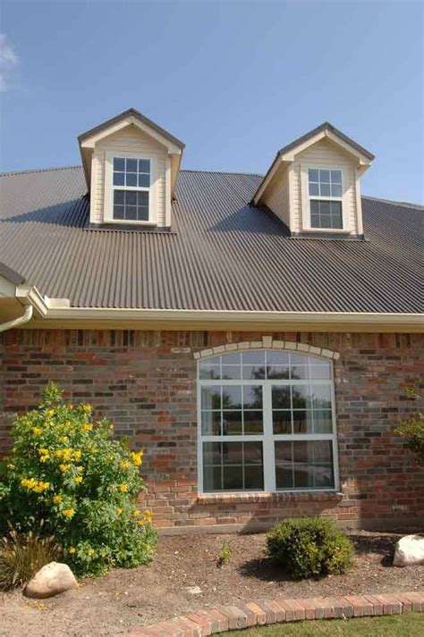 burnished slate metal roof on brick house|burnished metal roof.